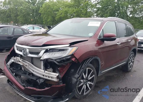 2021 Honda Pilot Awd Touring 8 Passenger z USA, uszkodzony, nr VIN 5FNYF6H92MB002640